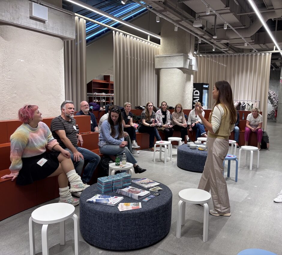 CARE household participants listen to a facilitator during a personal style workshop in Berlin.